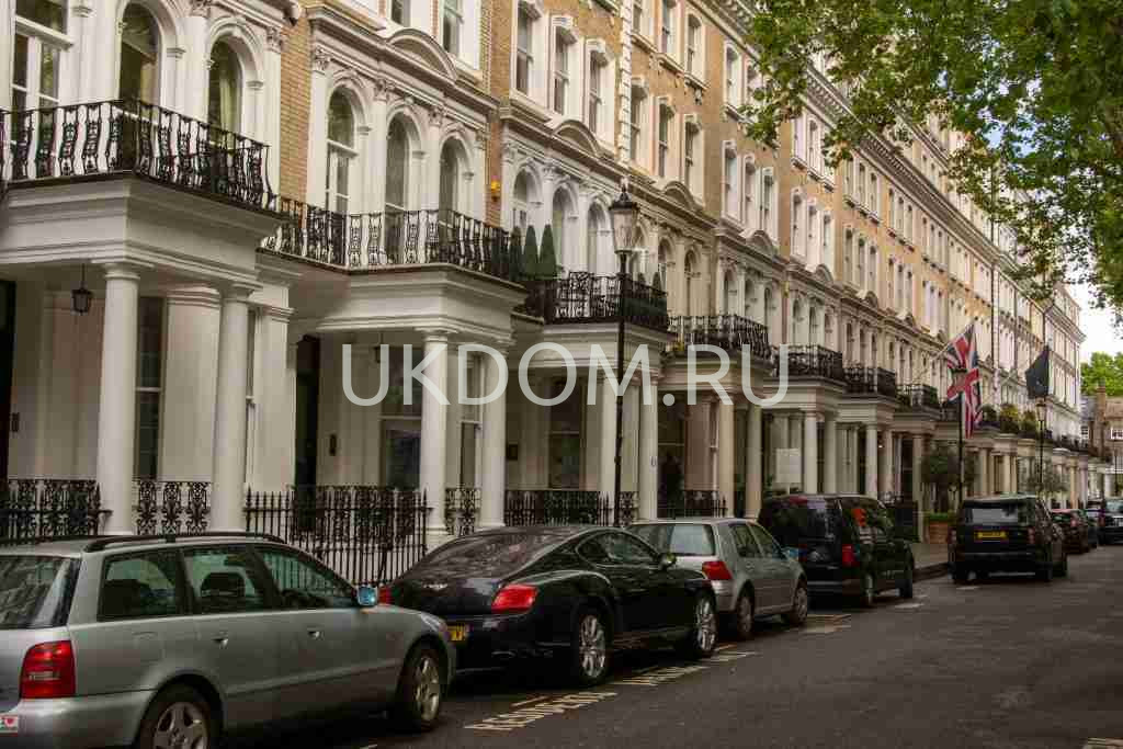 pexels-photo-29579462-29579462 Row of luxury Georgian terrace houses with parked cars in London, United Kingdom.