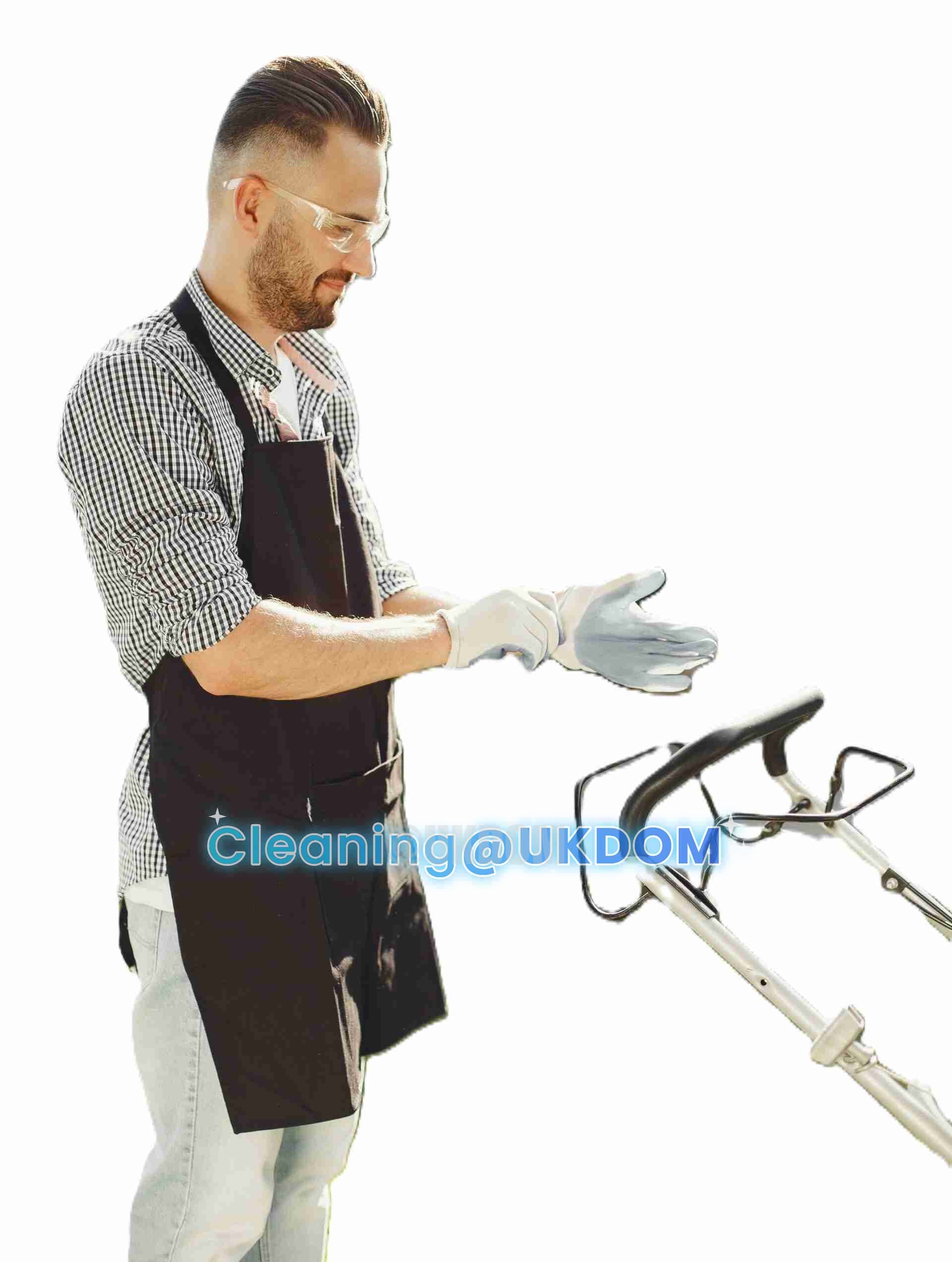 Gardener from a domestic cleaning couple pulling on work gloves before mowing a London garden